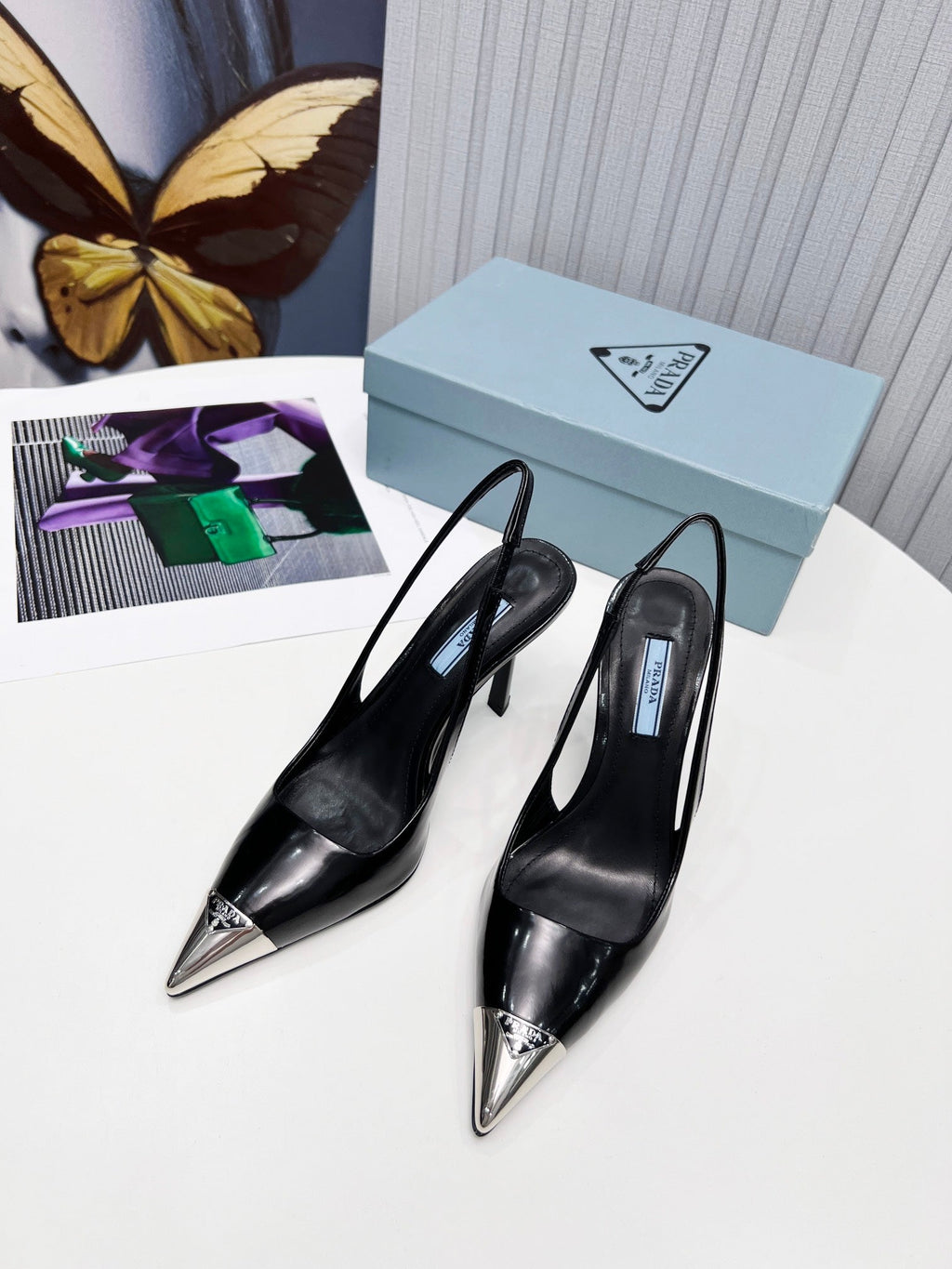 PRADA 26S SLINGBACK HEELS 95MM IN BLACK METAL TIP CALFSKIN