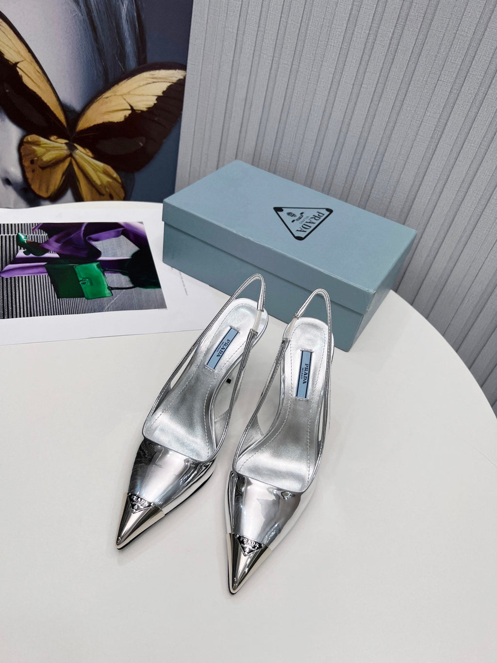 PRADA 26S SLINGBACK HEELS 95MM IN SILVER METAL TIP CALFSKIN