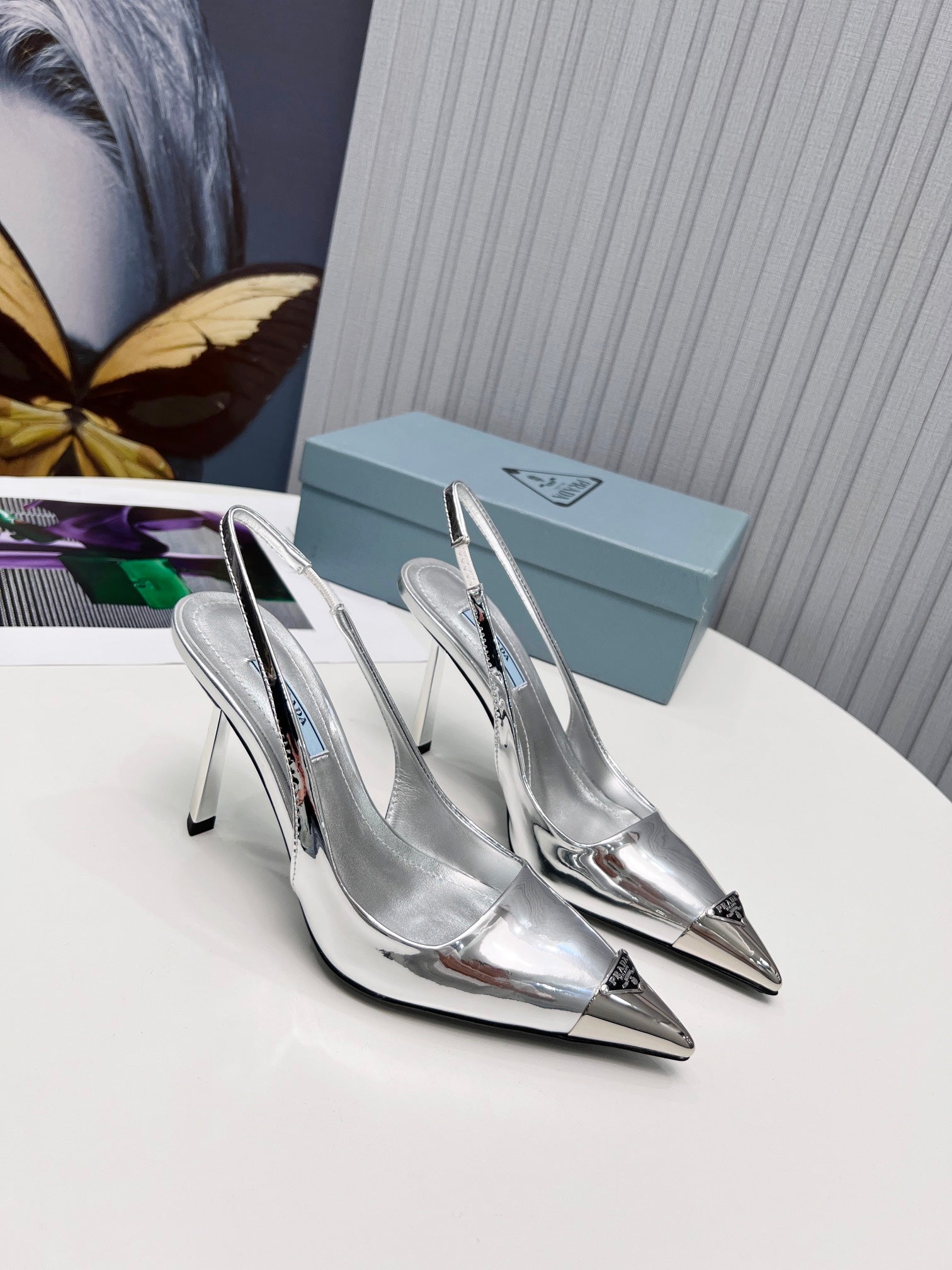 PRADA 26S SLINGBACK HEELS 95MM IN SILVER METAL TIP CALFSKIN