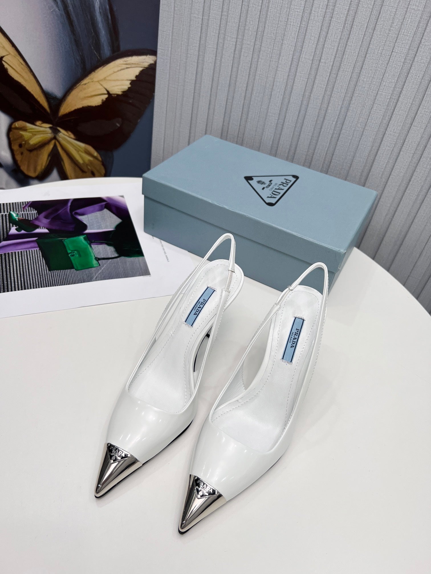 PRADA 26S SLINGBACK HEELS 95MM IN WHITE METAL TIP CALFSKIN