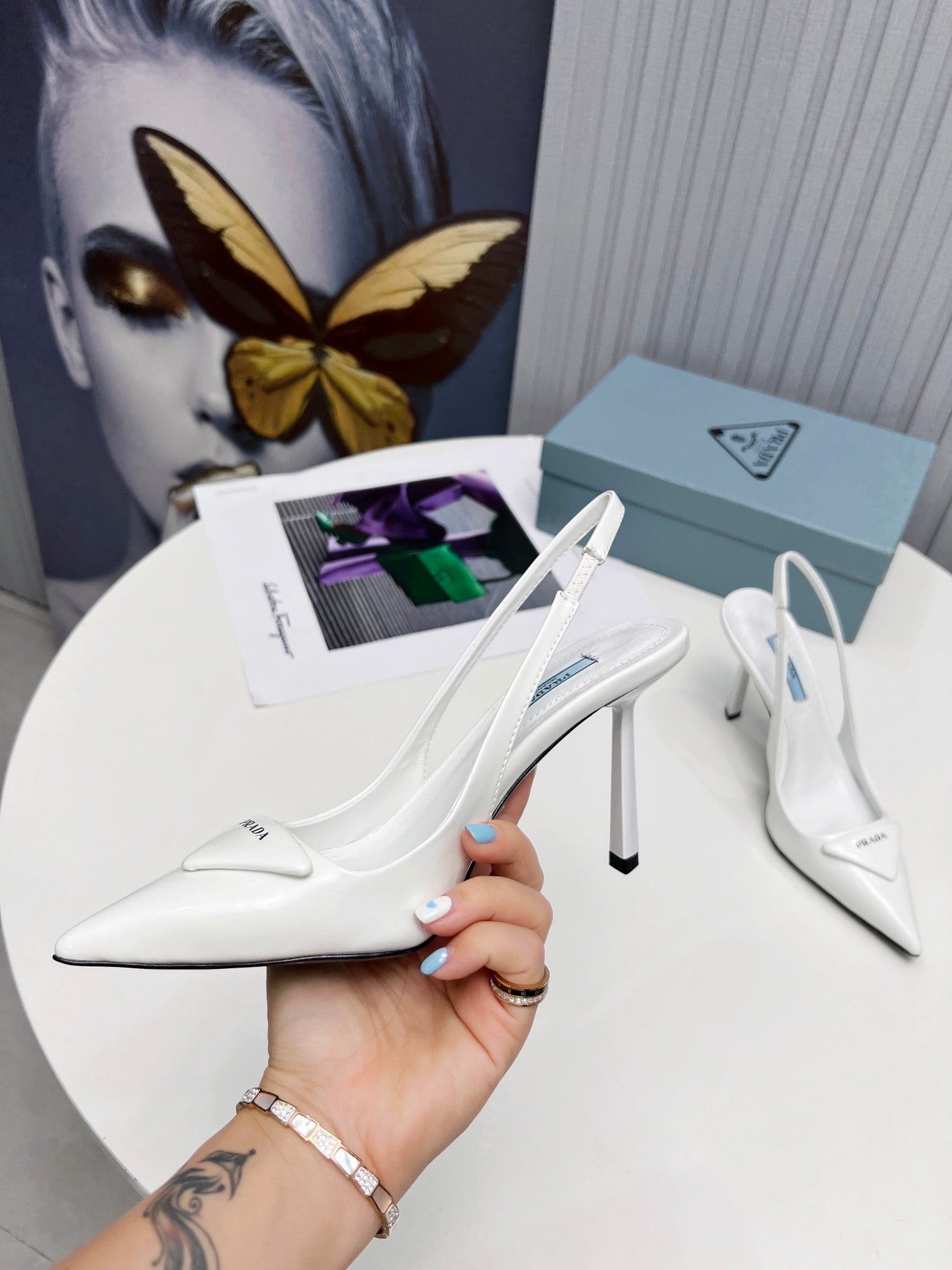 PRADA 26S SLINGBACK PUMPS STILETTO HEEL 95MM IN WHITE PATENT CALFSKIN LOGO
