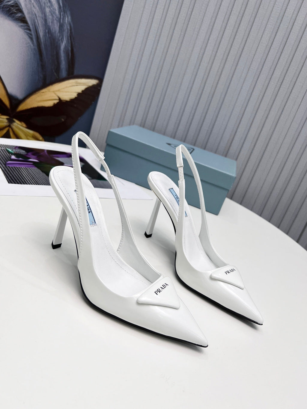 PRADA 26S SLINGBACK PUMPS STILETTO HEEL 95MM IN WHITE PATENT CALFSKIN LOGO