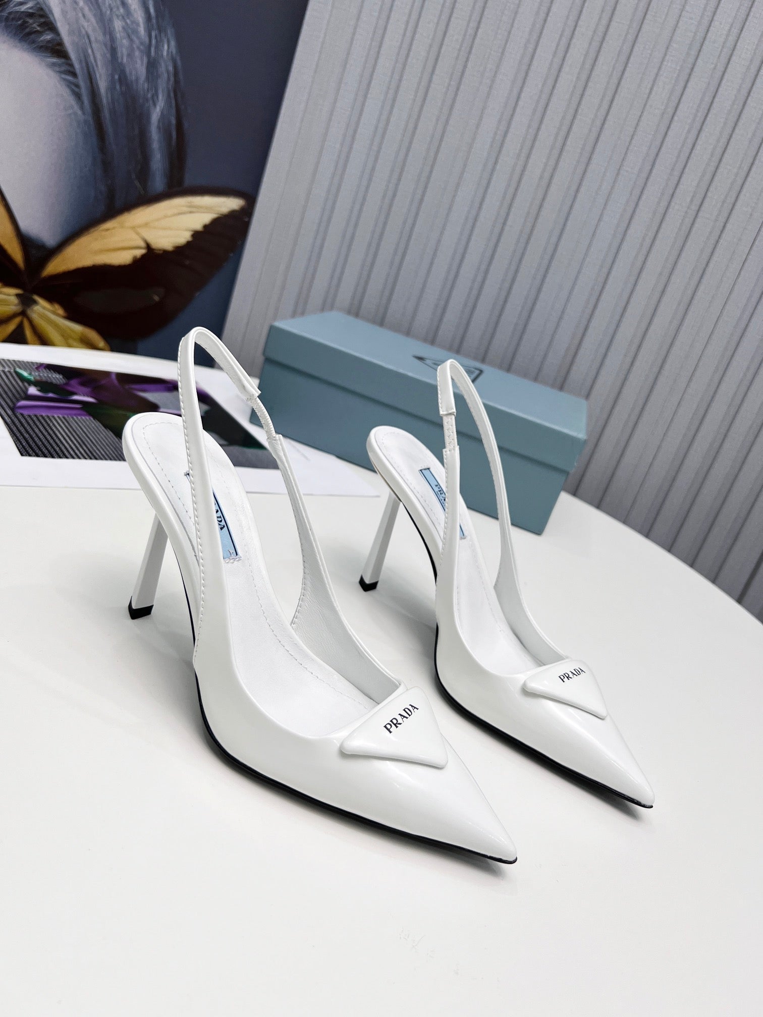 PRADA 26S SLINGBACK PUMPS STILETTO HEEL 95MM IN WHITE PATENT CALFSKIN LOGO