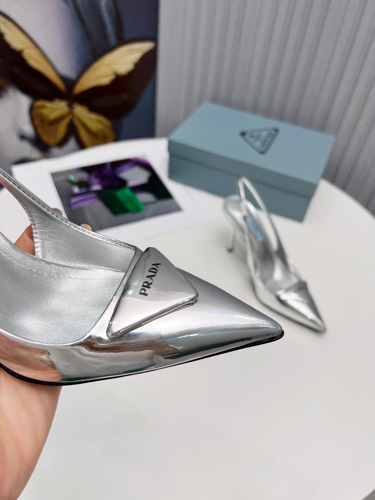 PRADA 26S SLINGBACK PUMPS STILETTO HEEL 95MM IN SILVER PATENT CALFSKIN LOGO