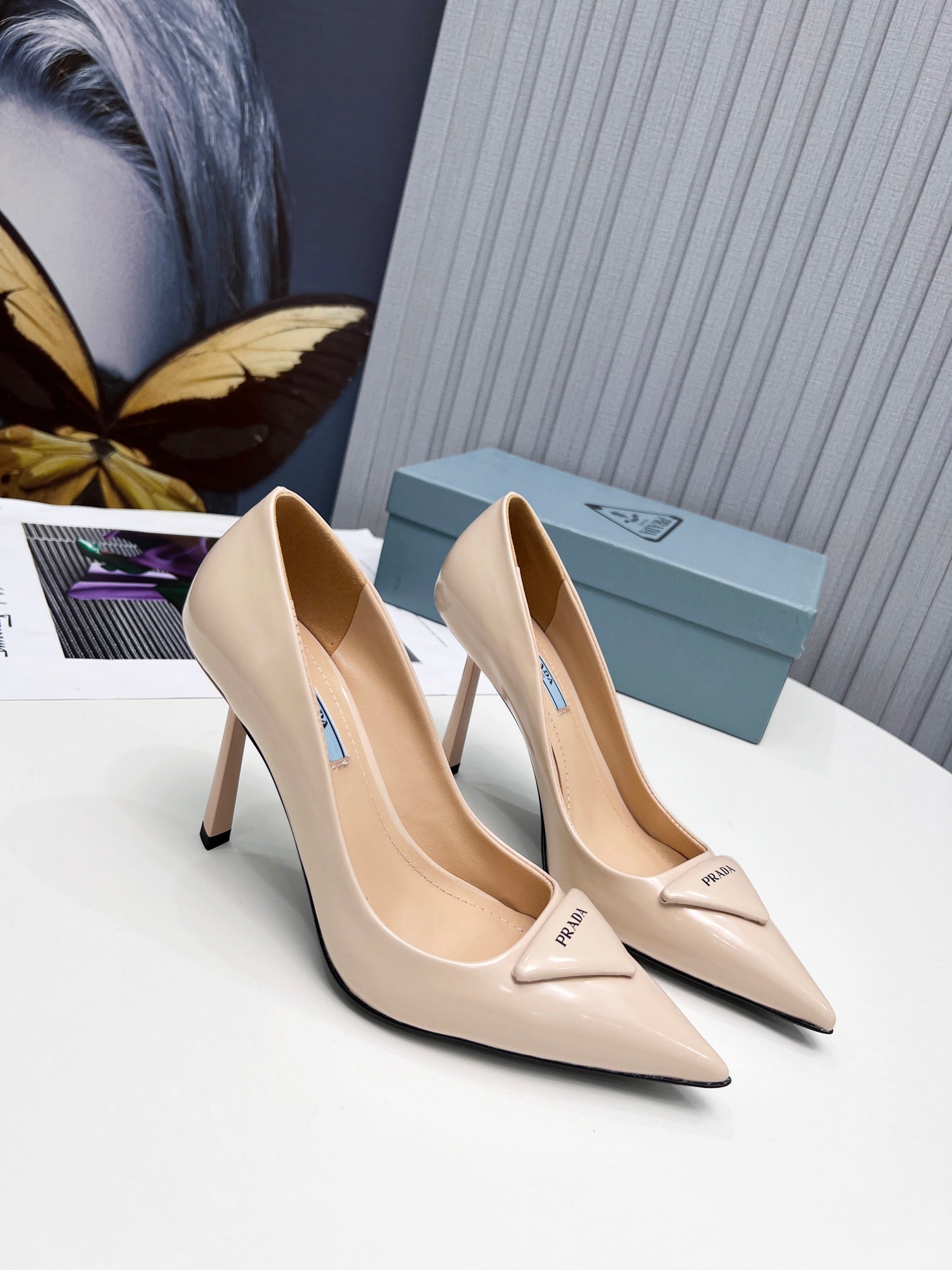 PRADA 26S POINTED TOE PUMPS STILETTO HEEL 95MM IN NUDE BEIGE PATENT CALFSKIN LOGO