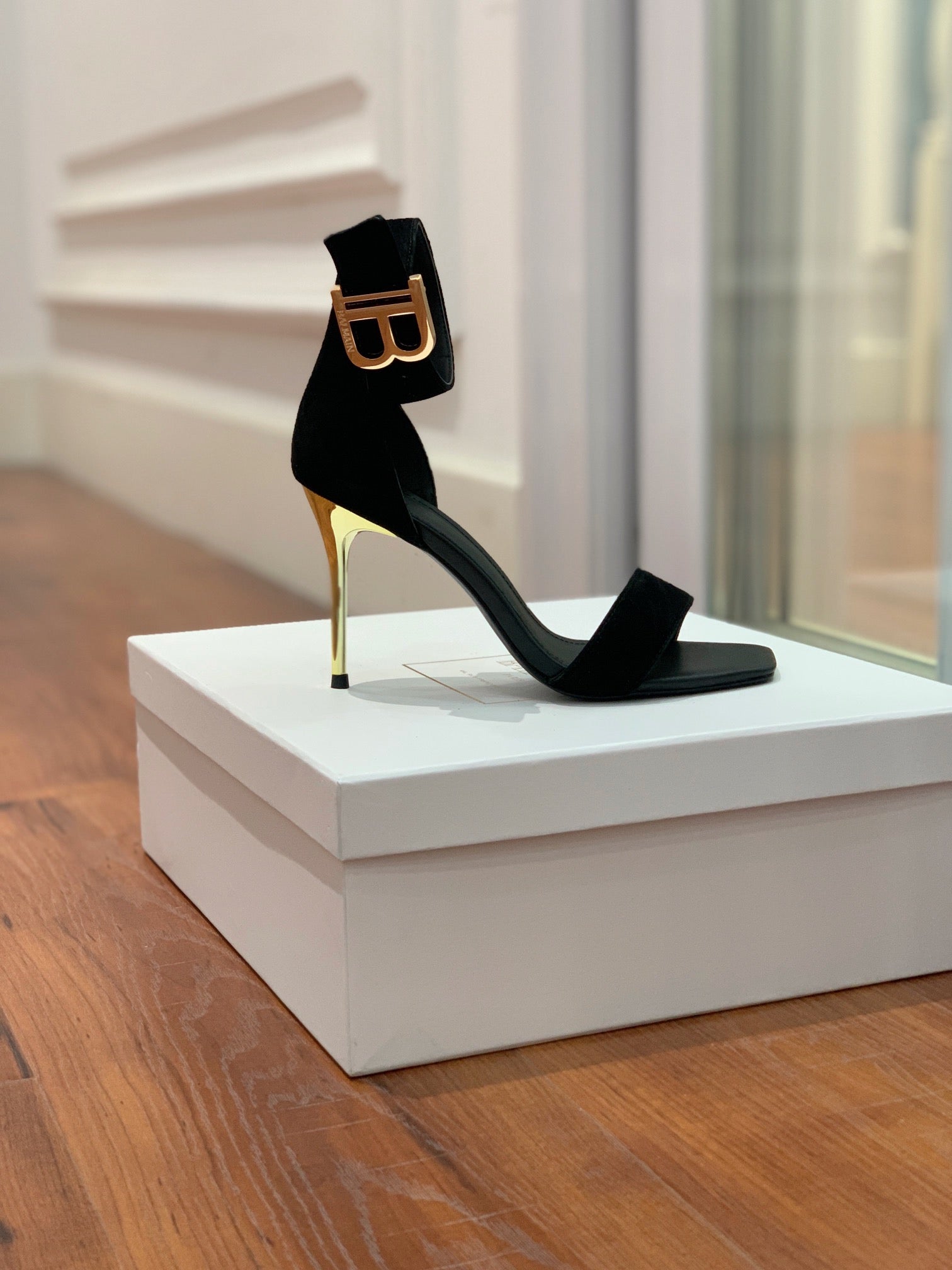 BALMAIN 25S THIN STRAP HIGH HEELS 105MM IN BLACK SUEDE GOLD HARDWARE