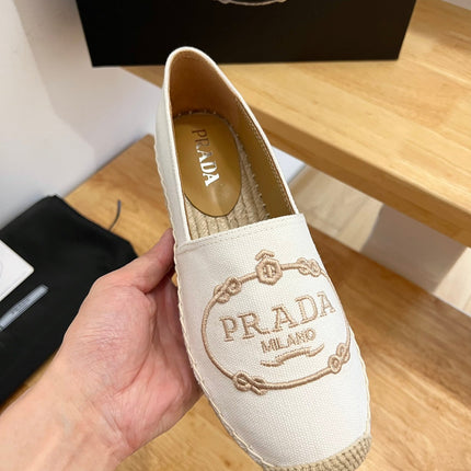 PRADA 26S EMBROIDERED LOGO ESPADRILLE FLATS IN IVORY WHITE CANVAS