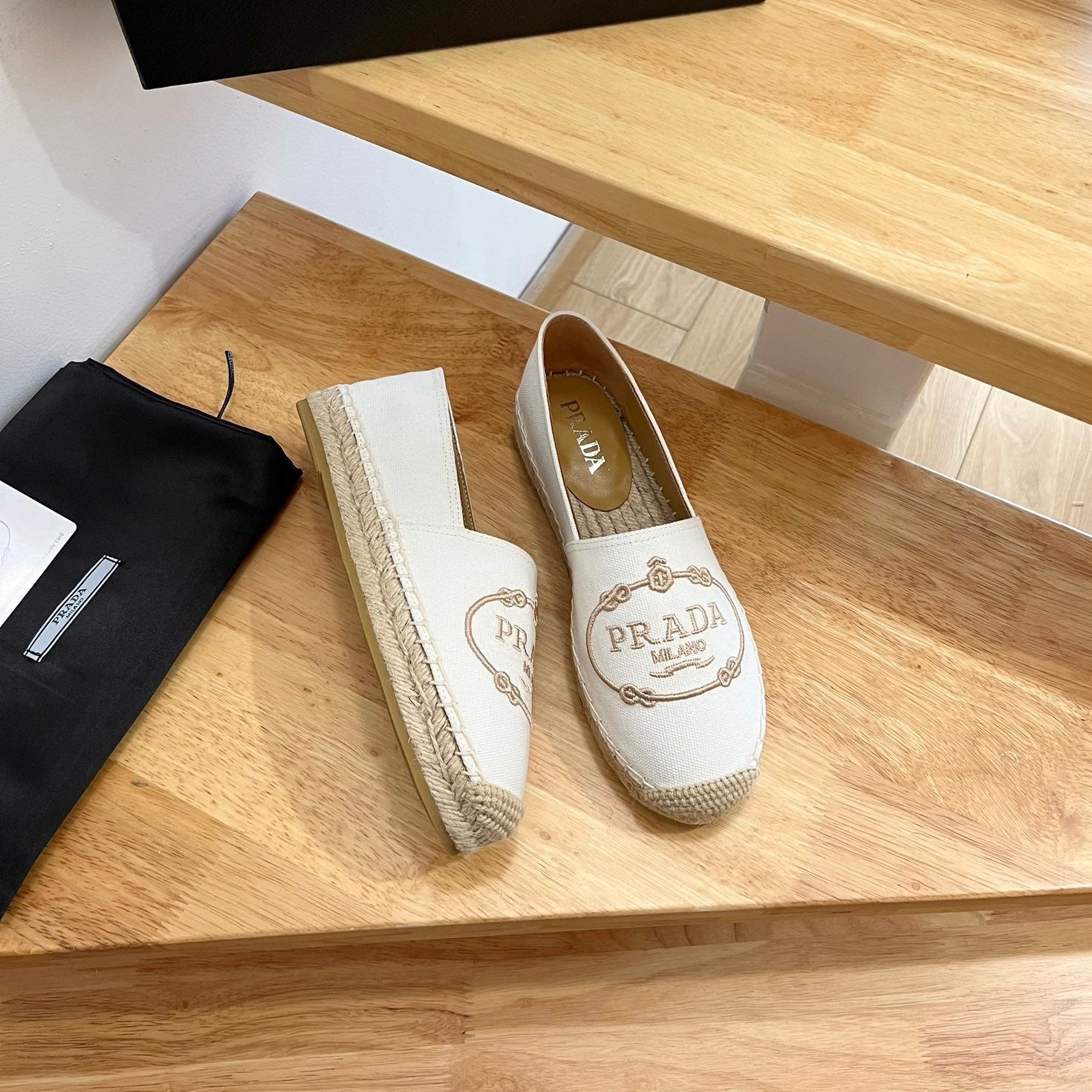PRADA 26S EMBROIDERED LOGO ESPADRILLE FLATS IN IVORY WHITE CANVAS