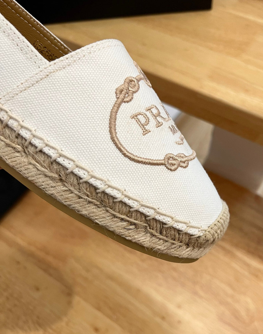 PRADA 26S EMBROIDERED LOGO ESPADRILLE FLATS IN IVORY WHITE CANVAS