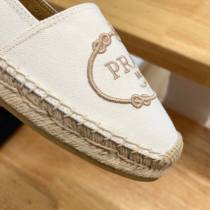 PRADA 26S EMBROIDERED LOGO ESPADRILLE FLATS IN IVORY WHITE CANVAS