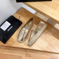 PRADA 26S EMBROIDERED LOGO ESPADRILLE FLATS IN GOLD CALFSKIN