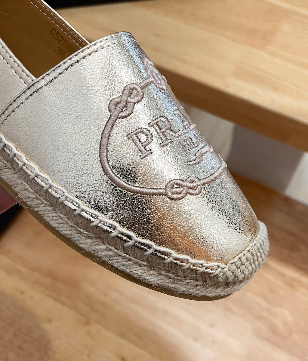 PRADA 26S EMBROIDERED LOGO ESPADRILLE FLATS IN GOLD CALFSKIN