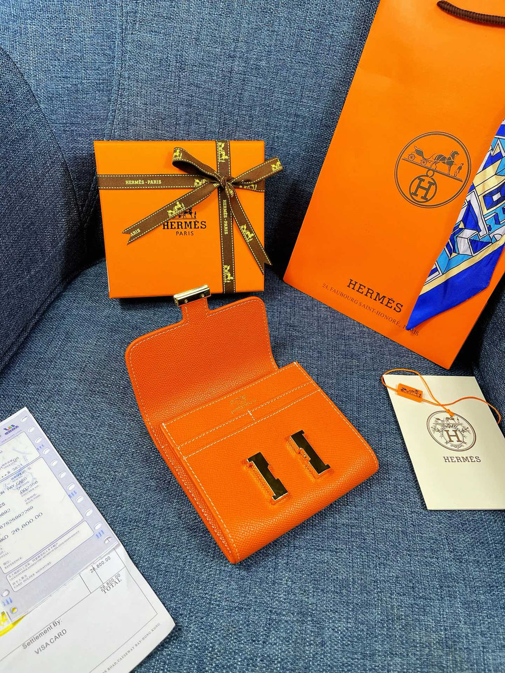 HM CONSTANCE 12 ORANGE CALFSKIN GOLD HARDWARE