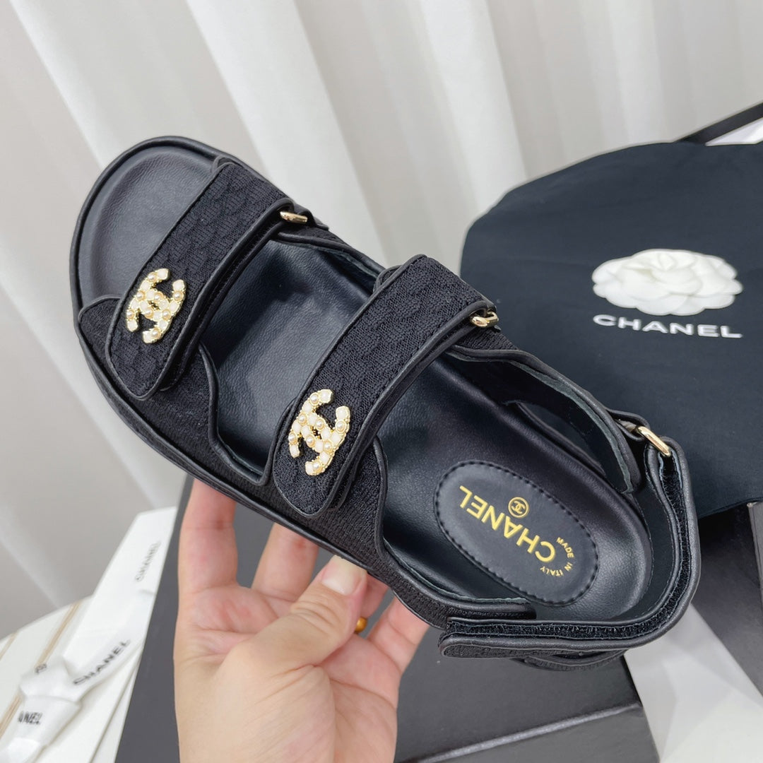 CHANEL 26S SANDALS IN BLACK FABRIC WITH PEARL-EMBELLISHED LOGO