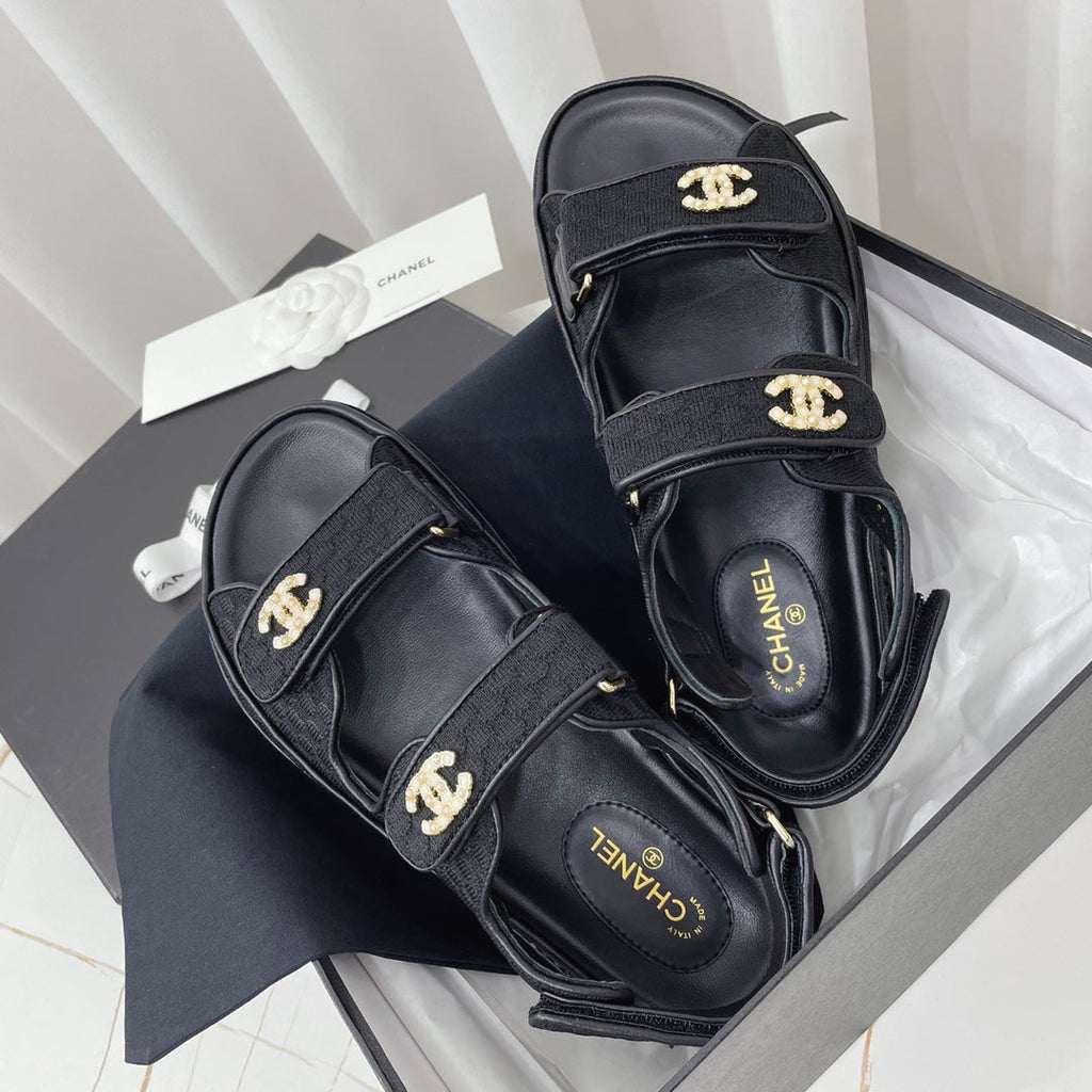 CHANEL 26S SANDALS IN BLACK FABRIC WITH PEARL-EMBELLISHED LOGO