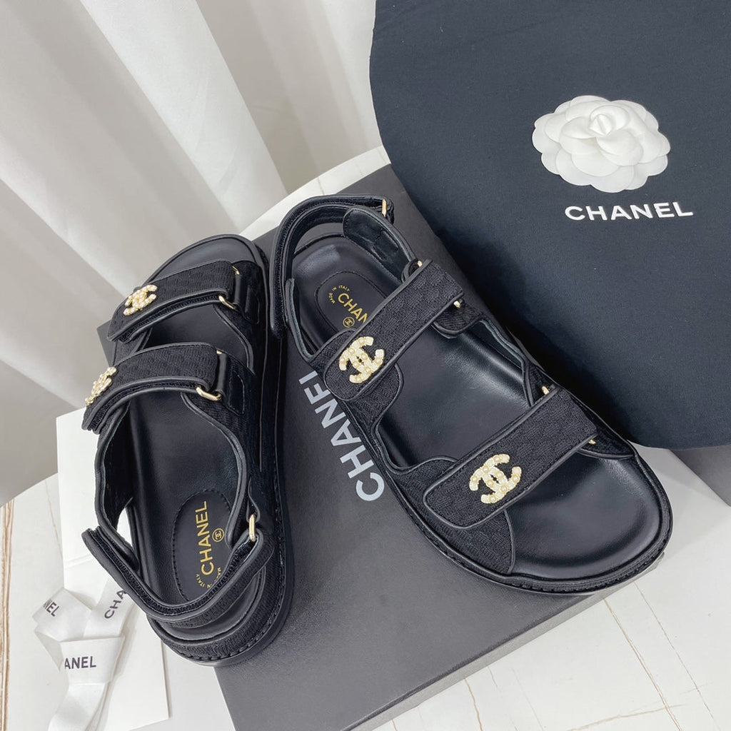 CHANEL 26S SANDALS IN BLACK FABRIC WITH PEARL-EMBELLISHED LOGO