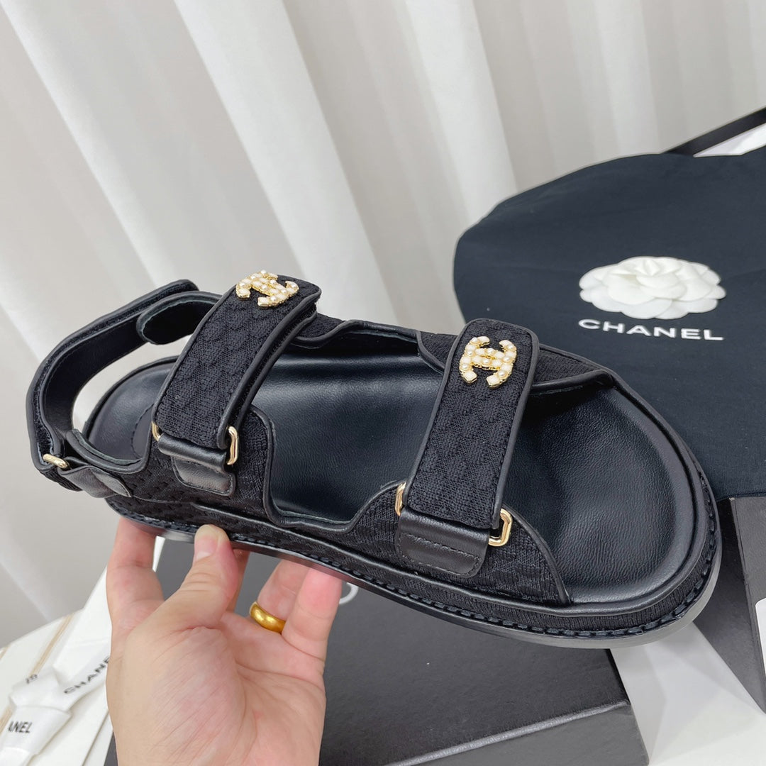 CHANEL 26S SANDALS IN BLACK FABRIC WITH PEARL-EMBELLISHED LOGO