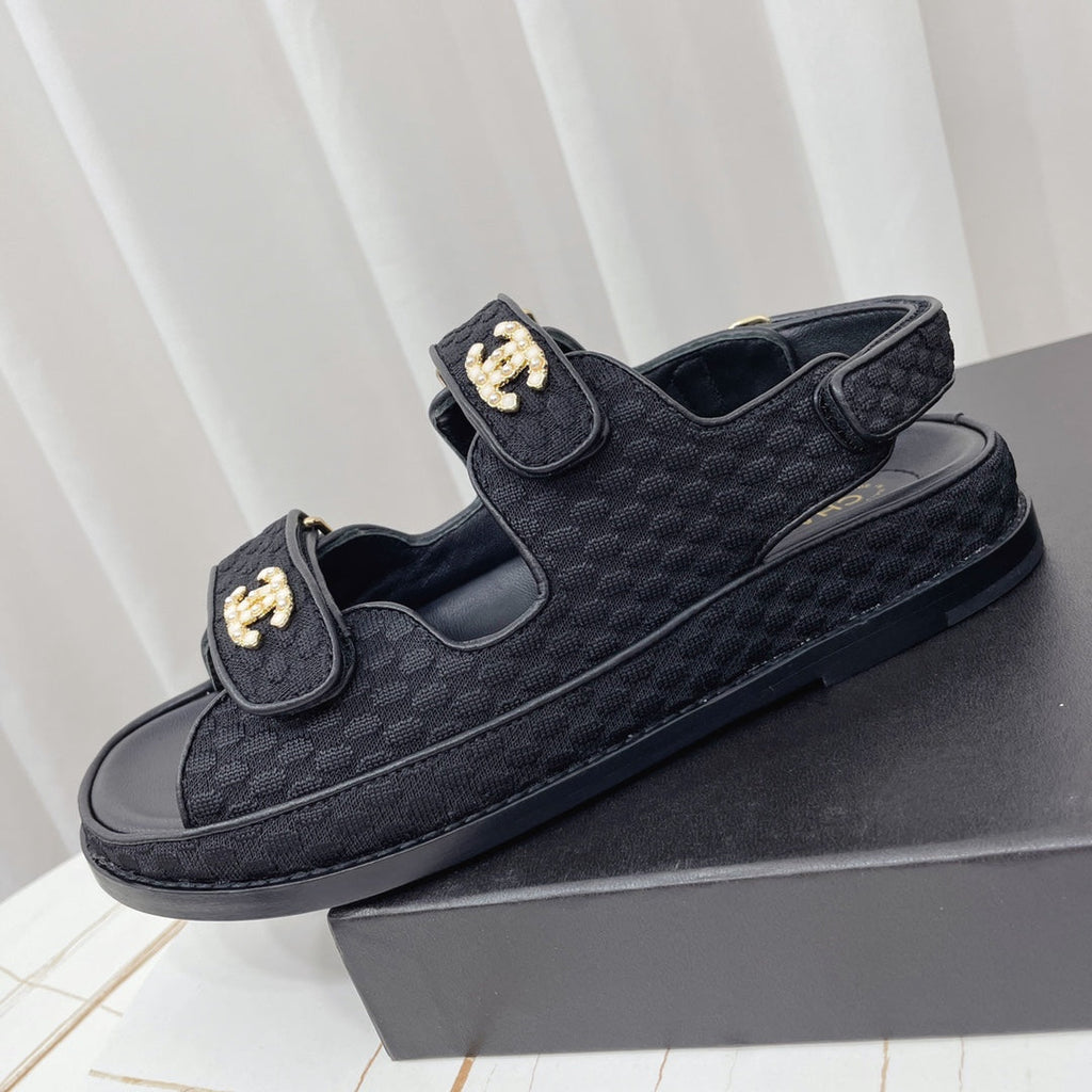 CHANEL 26S SANDALS IN BLACK FABRIC WITH PEARL-EMBELLISHED LOGO