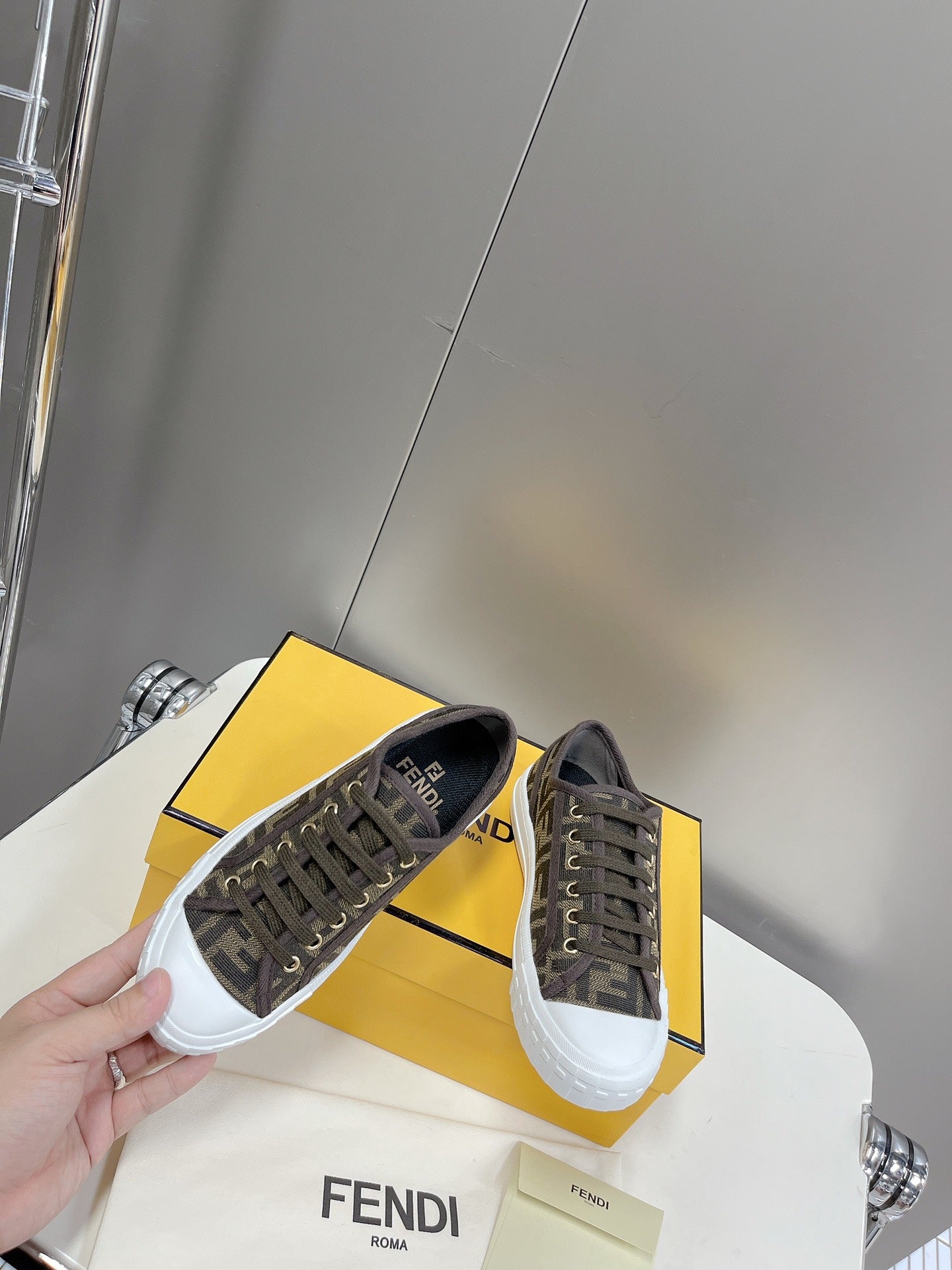 FENDI DOMINO MOTIF LOW-TOP SNEAKERS IN BROWN CANVAS
