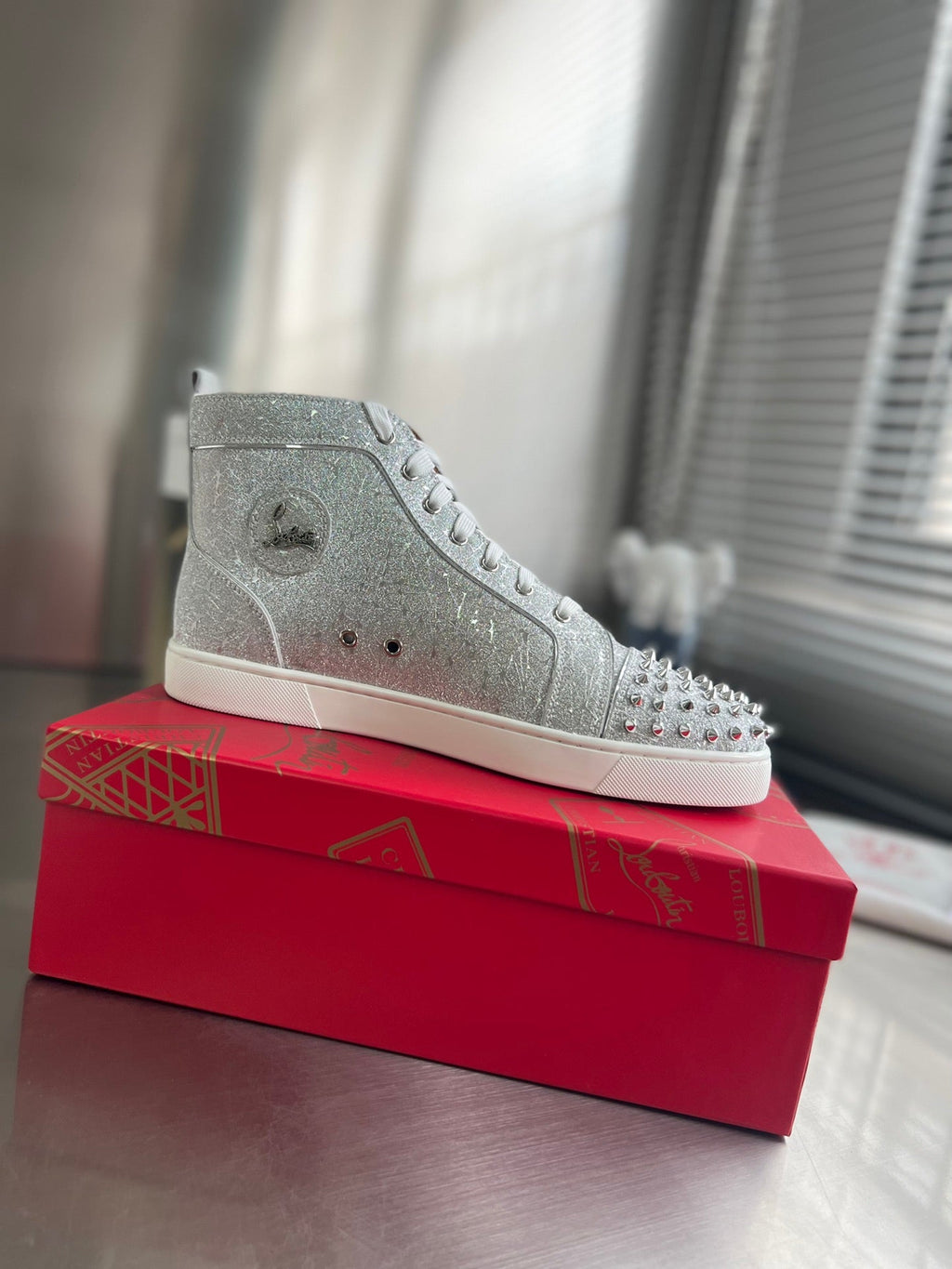 GLITTER LOU SPIKES STUDDED HIGH-TOP SNEAKERS IN SILVER-TONE CALFSKIN