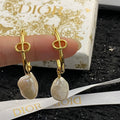 CD 26S BAROQUE PEARL DROP HOOP EARRINGS GOLD TONE METAL 645491