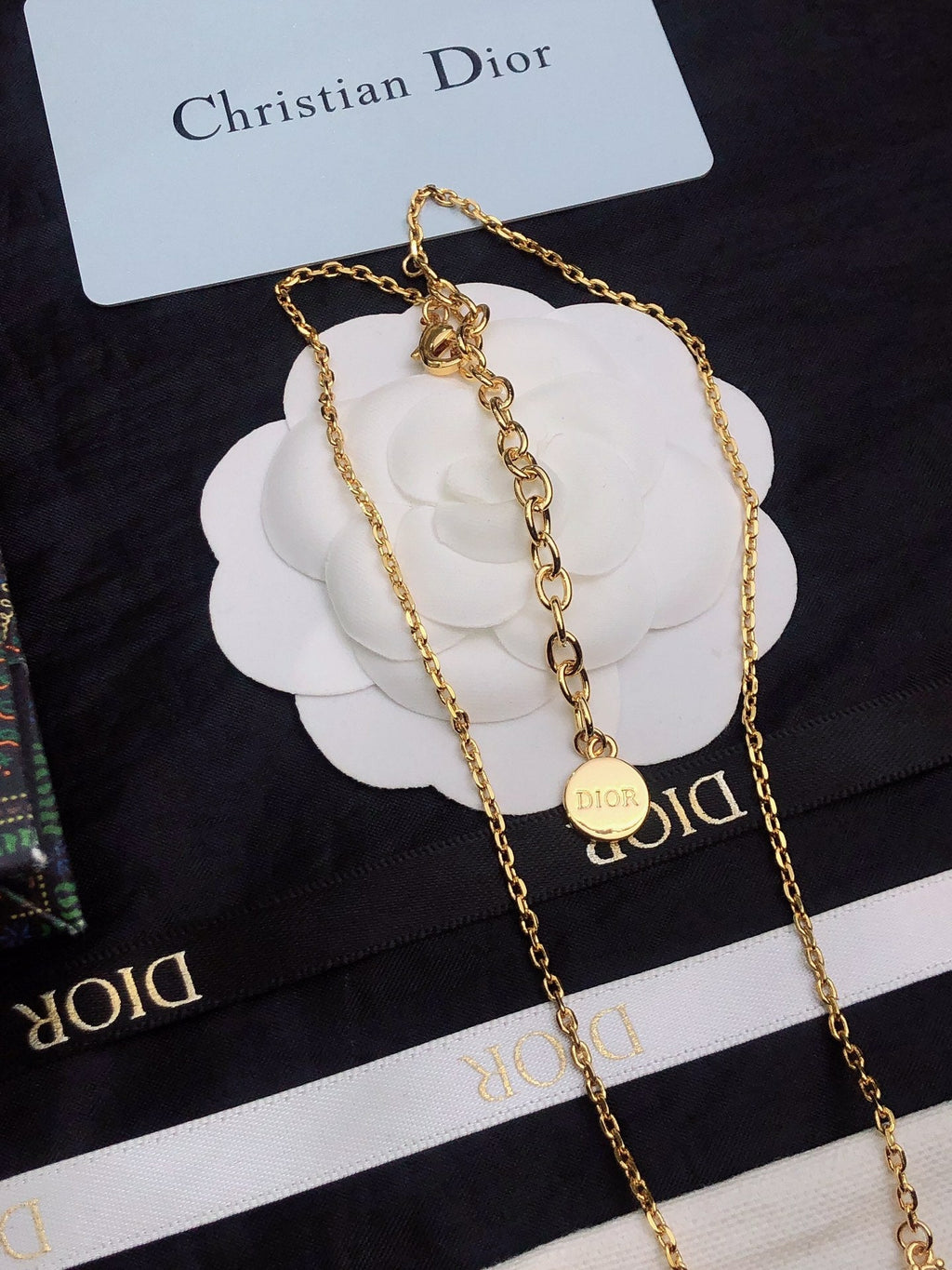 CD 26S CD LOGO CRYSTAL STATION NECKLACE IN GOLD TONE METAL WITH WHITE CRYSTAL 631006