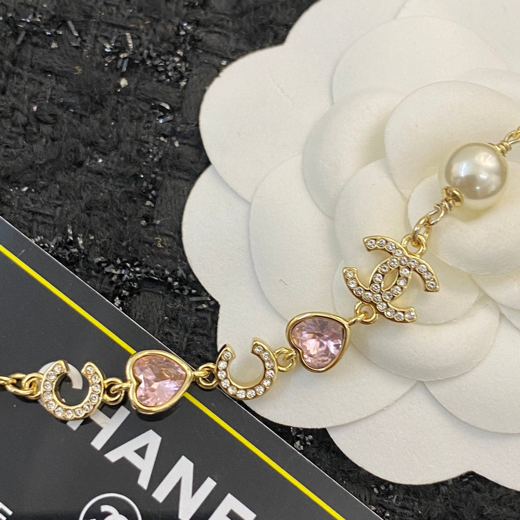 CHANEL 26S DOUBLE C LETTER PEARL NECKLACE WITH HEART CHARMS IN GOLD METAL 631850