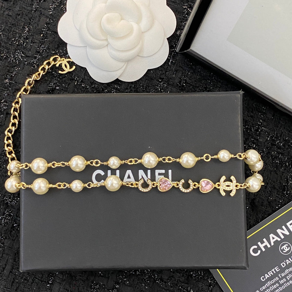 CHANEL 26S DOUBLE C LETTER PEARL NECKLACE WITH HEART CHARMS IN GOLD METAL 631850