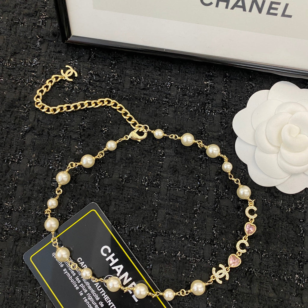 CHANEL 26S DOUBLE C LETTER PEARL NECKLACE WITH HEART CHARMS IN GOLD METAL 631850