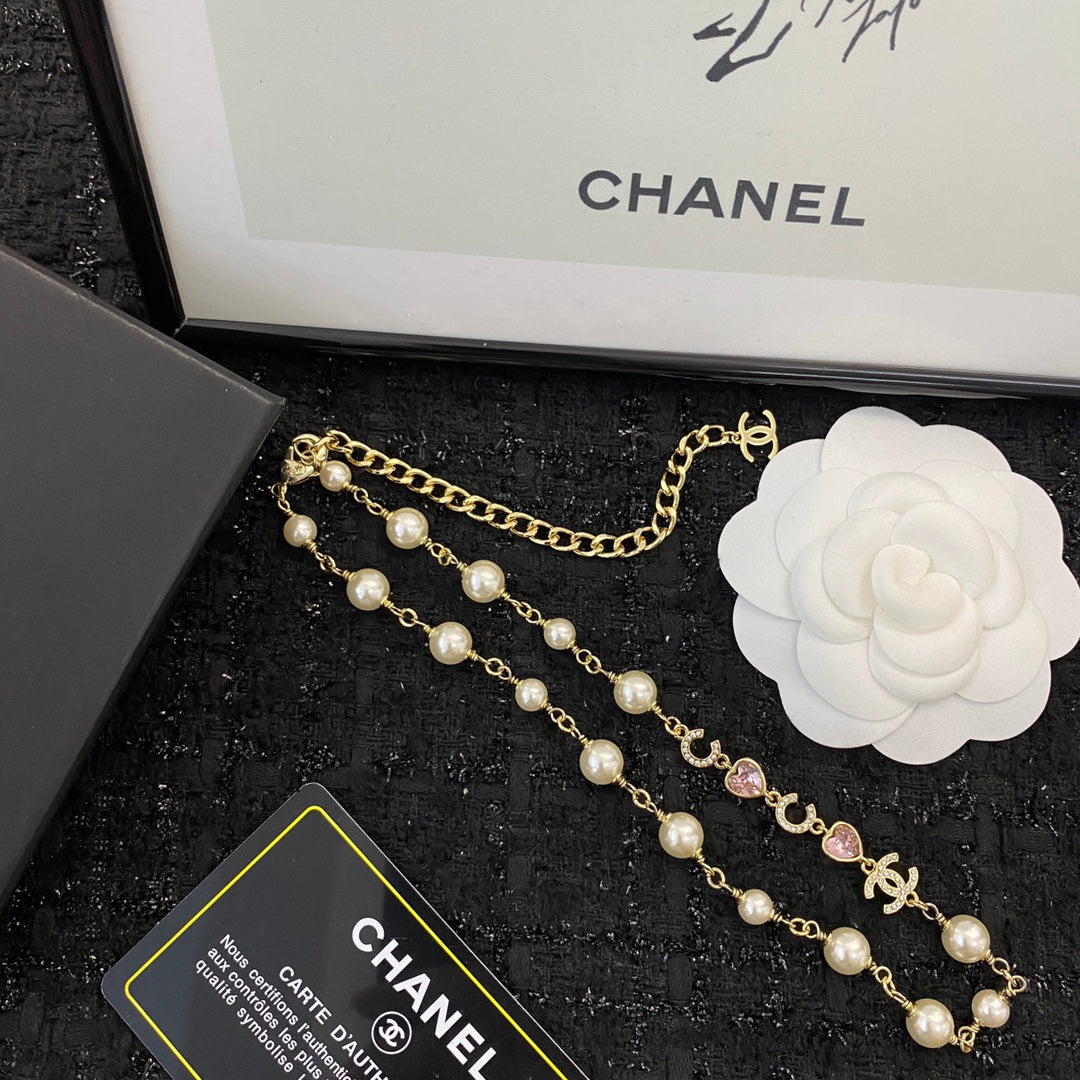 CHANEL 26S DOUBLE C LETTER PEARL NECKLACE WITH HEART CHARMS IN GOLD METAL 631850