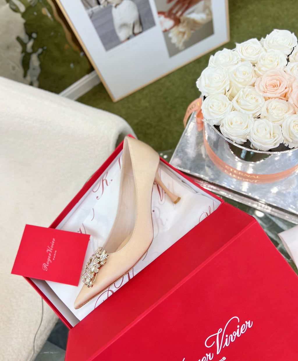 EFFLORESCENCE POINTED-TOE PUMPS IN NUDE SATIN WITH CRYSTAL BUCKLE