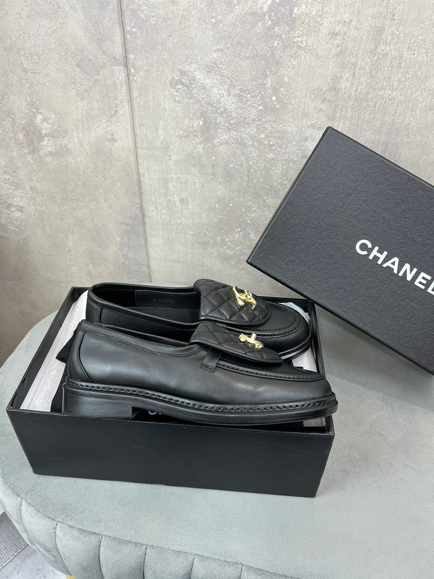 CHANEL 26S LOAFERS IN BLACK QUILTED CALFSKIN WITH CC LOGO