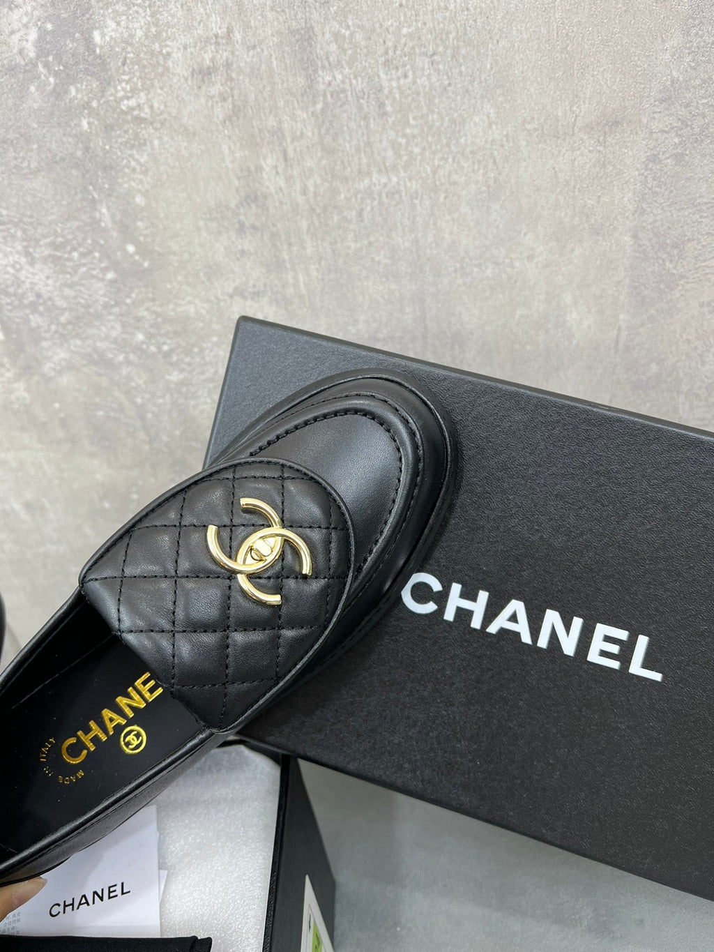CHANEL 26S LOAFERS IN BLACK QUILTED CALFSKIN WITH CC LOGO