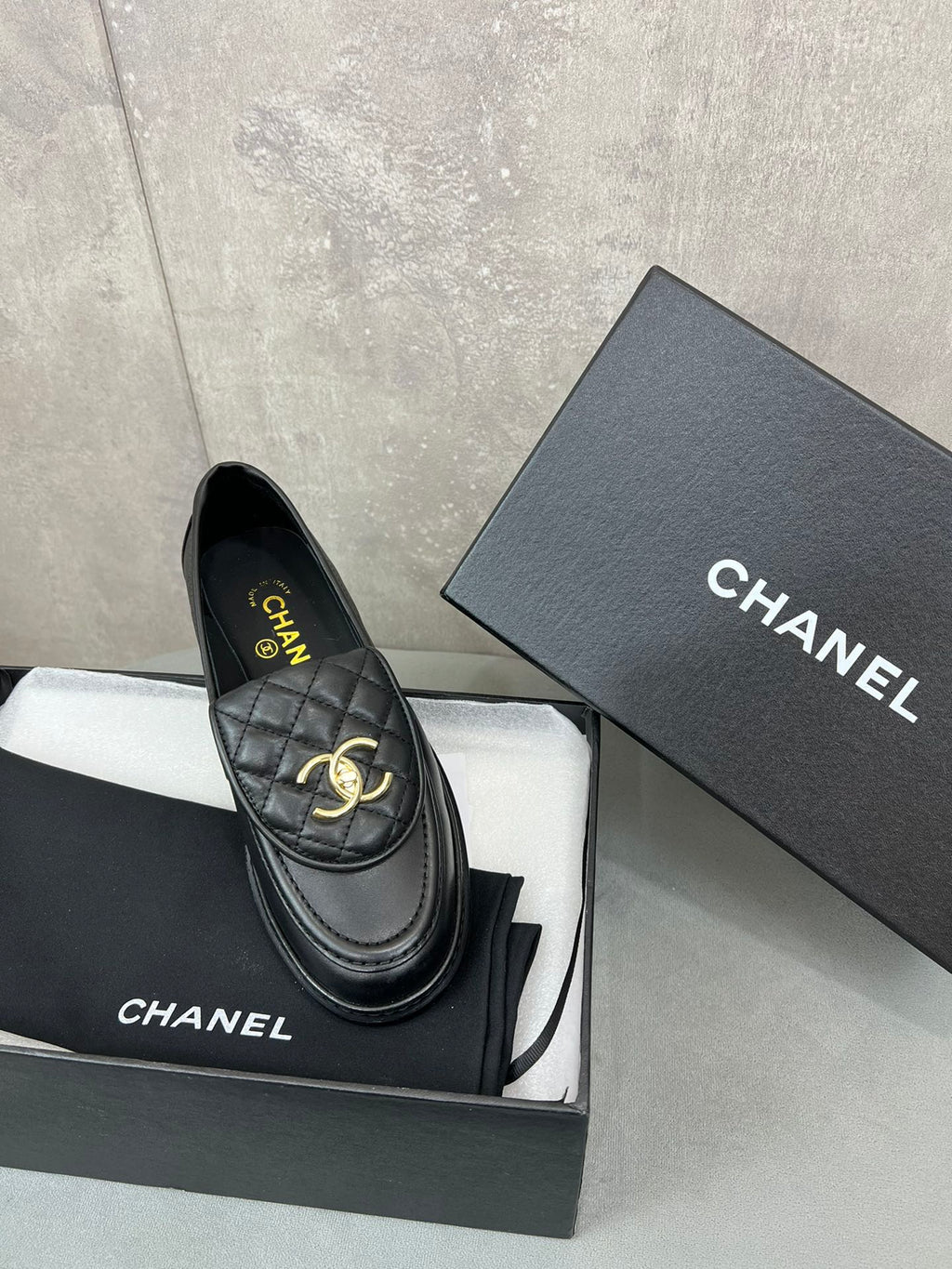 CHANEL 26S LOAFERS IN BLACK QUILTED CALFSKIN WITH CC LOGO