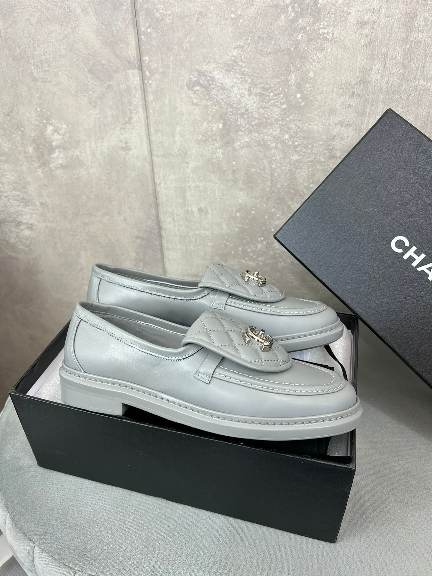 CHANEL 26S LOAFERS IN GREY QUILTED CALFSKIN WITH CC LOGO