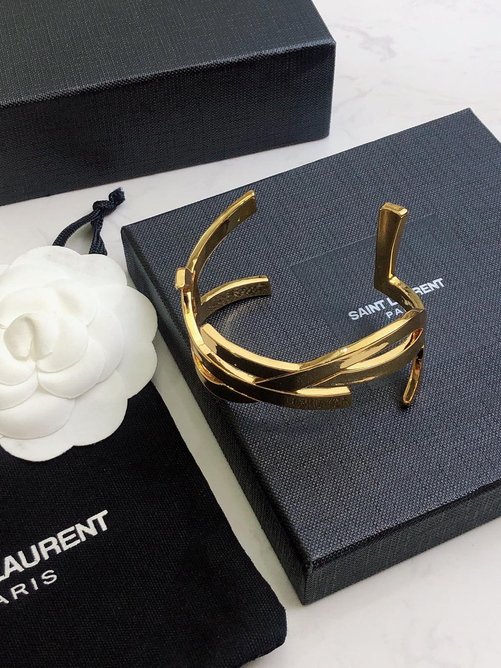 YSL 26S CRISS CROSS OPEN CUFF BRACELET IN GOLD TONE METAL 635064
