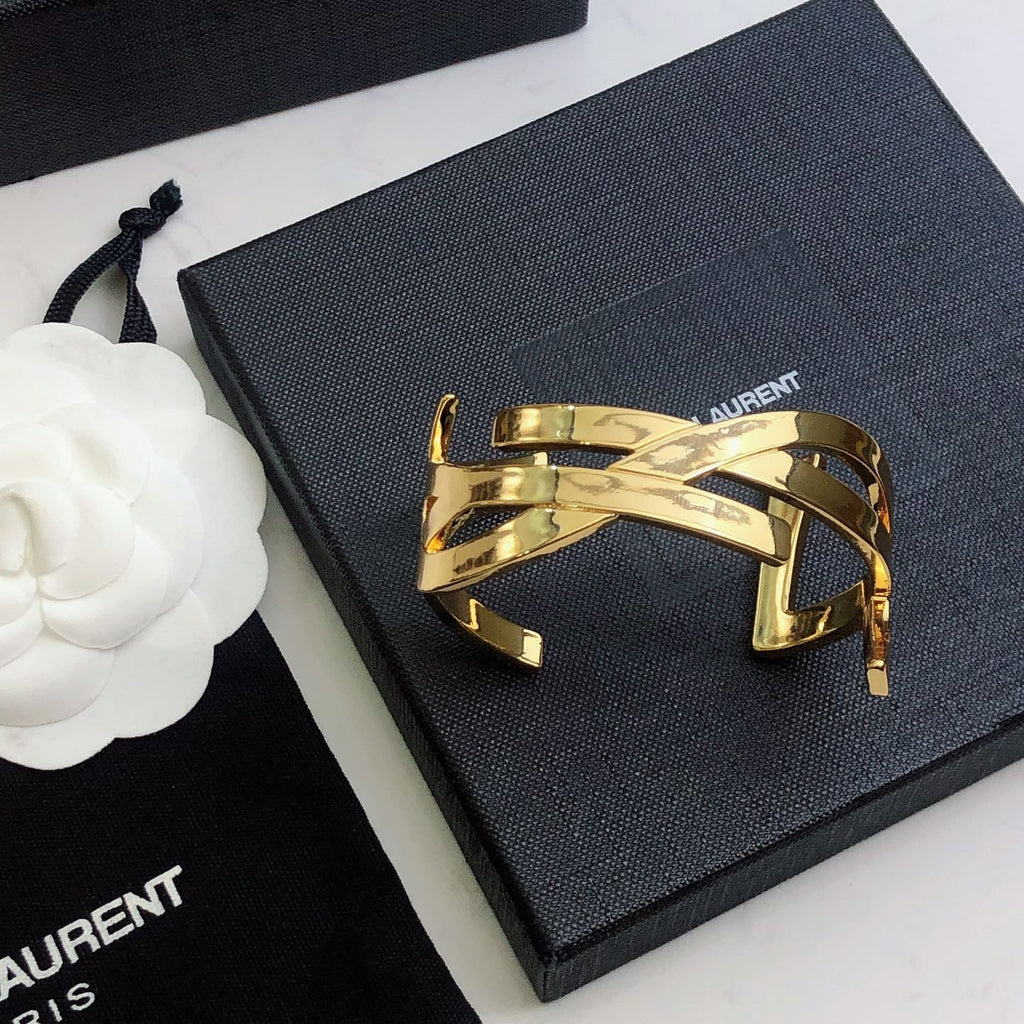 YSL 26S CRISS CROSS OPEN CUFF BRACELET IN GOLD TONE METAL 635064