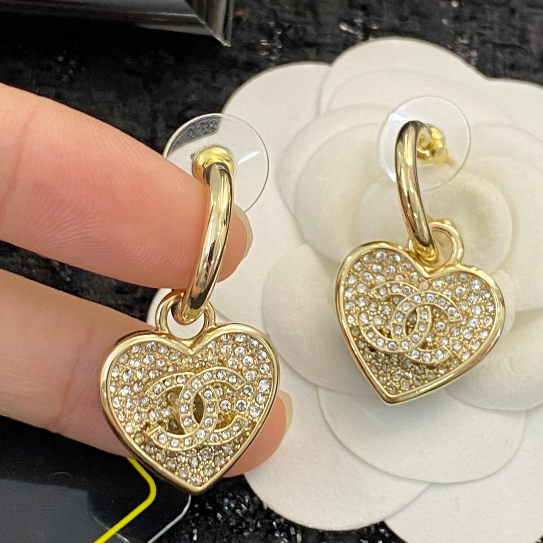 CHANEL 26S DOUBLE C LOGO FULL PAVE CRYSTAL HEART CHARM HOOP EARRINGS IN GOLD METAL 633110