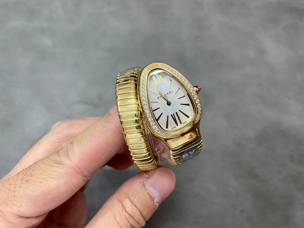 SERPENTI TUBOGAS QUARTZ YELLOW GOLD ATTACHED DIAMOND BEZEL SILVER OPALINE DIAL