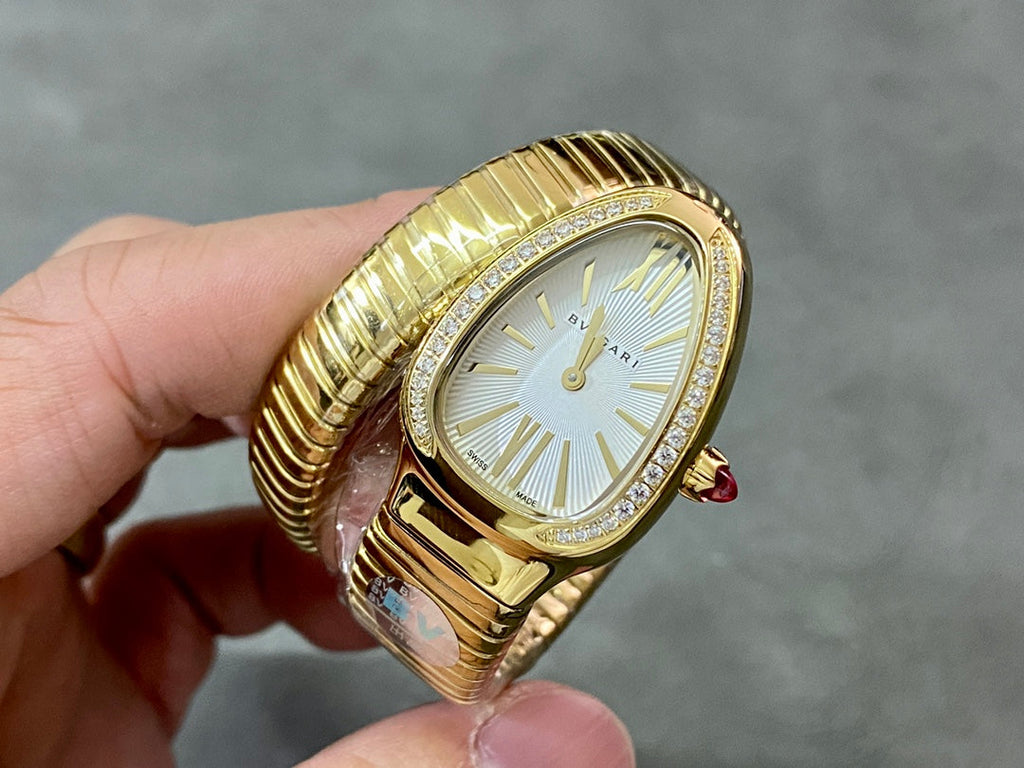 SERPENTI TUBOGAS QUARTZ YELLOW GOLD ATTACHED DIAMOND BEZEL SILVER OPALINE DIAL