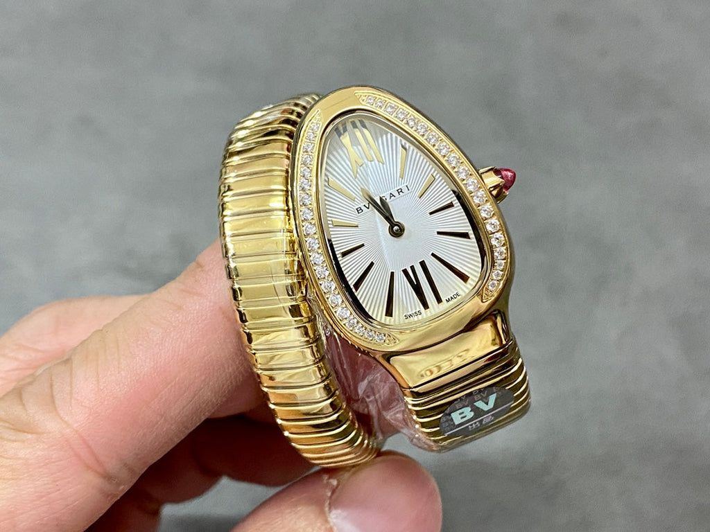SERPENTI TUBOGAS QUARTZ YELLOW GOLD ATTACHED DIAMOND BEZEL SILVER OPALINE DIAL