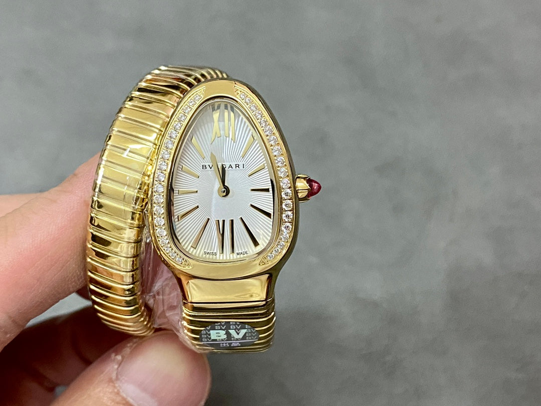 SERPENTI TUBOGAS QUARTZ YELLOW GOLD ATTACHED DIAMOND BEZEL SILVER OPALINE DIAL