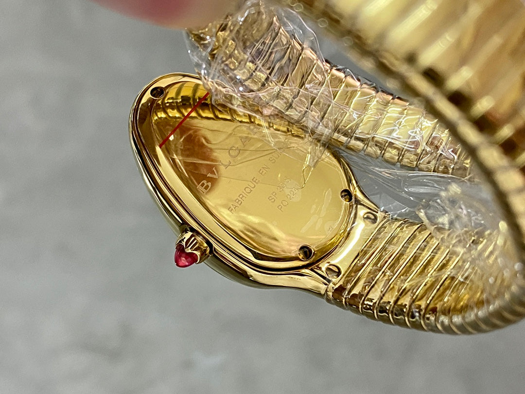 SERPENTI TUBOGAS QUARTZ YELLOW GOLD ATTACHED DIAMOND BEZEL SILVER OPALINE DIAL