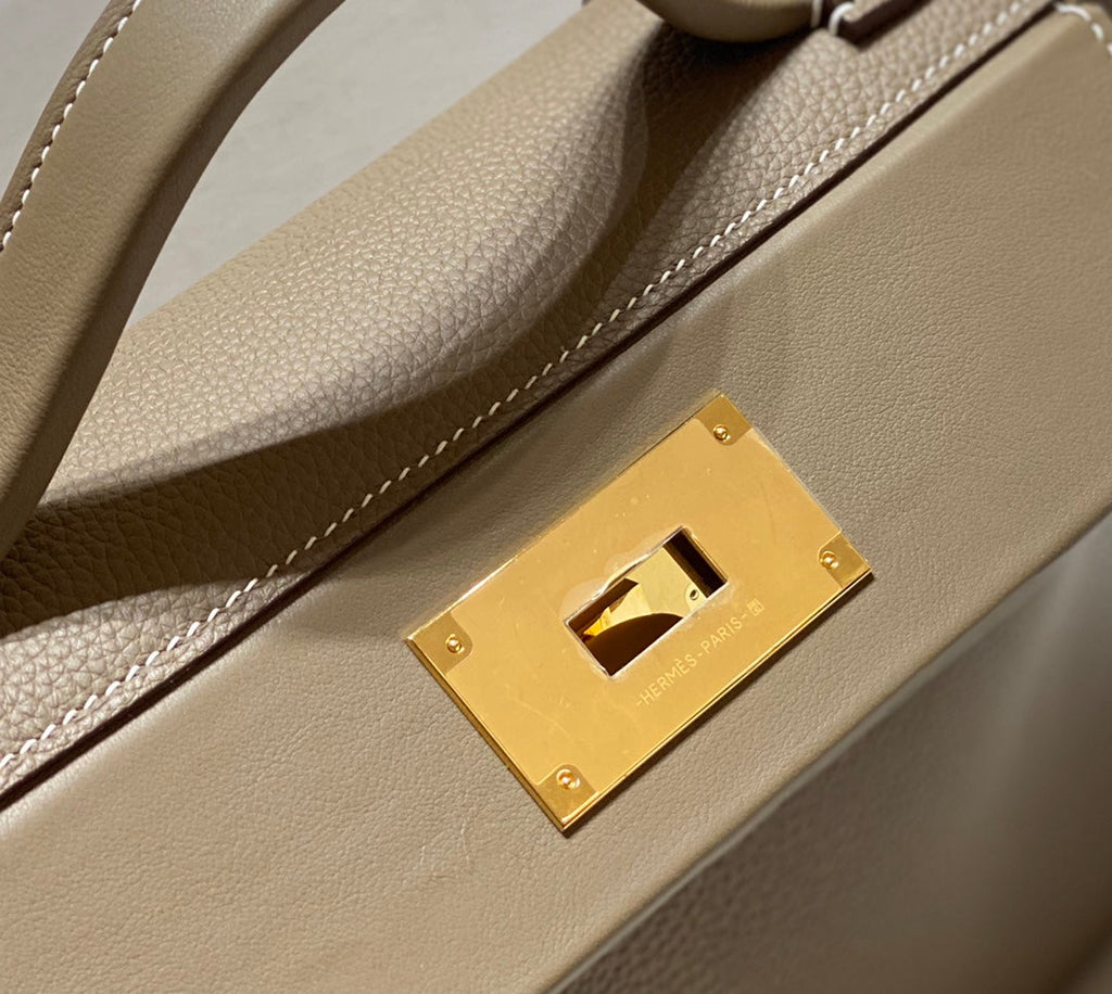 HM 26S 24/24 29CM IN BROWN EVERCOLOR CALFSKIN GOLD KELLY BUCKLE