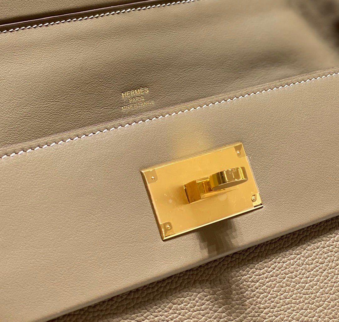 HM 26S 24/24 29CM IN BROWN EVERCOLOR CALFSKIN GOLD KELLY BUCKLE