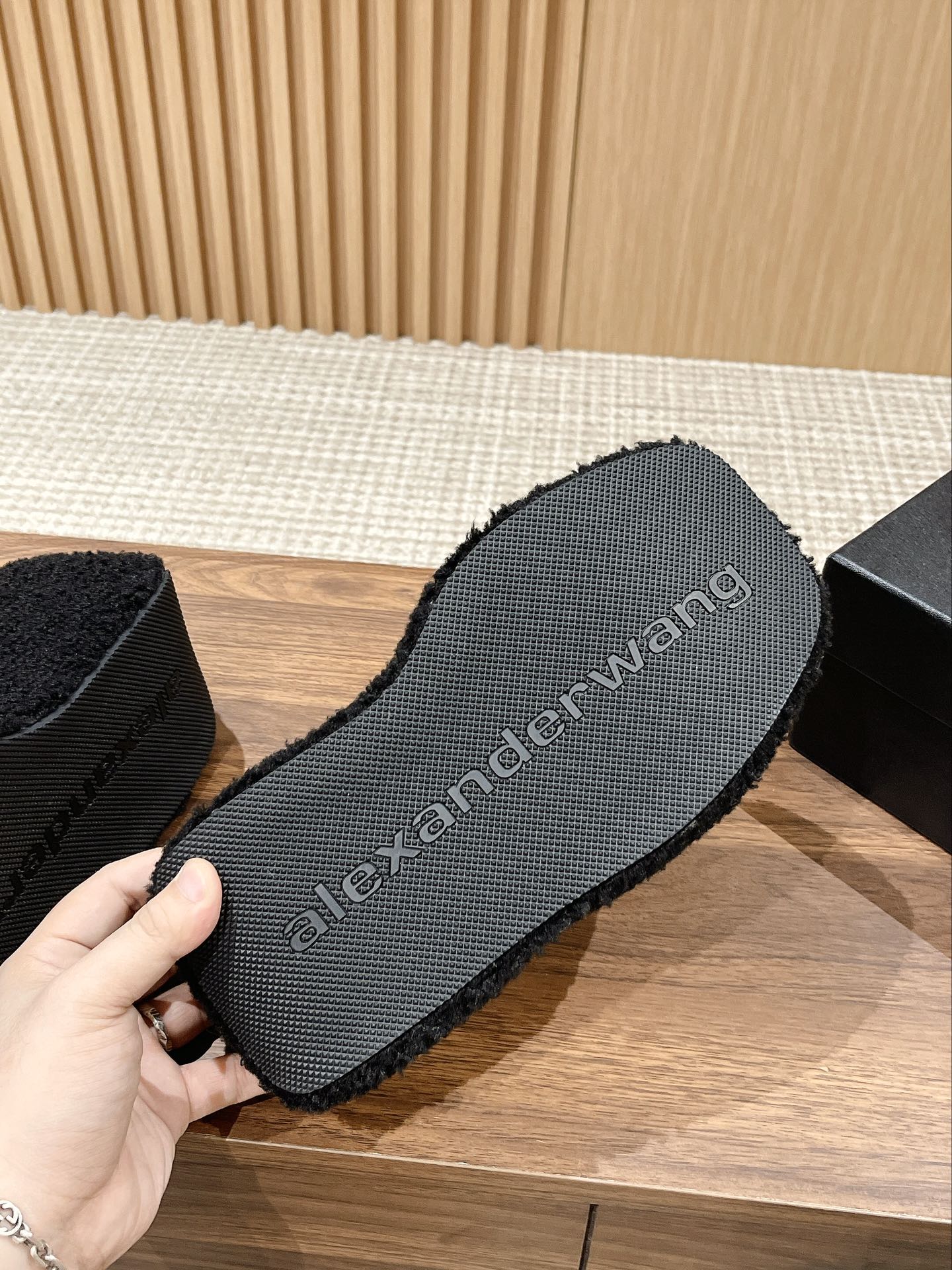 CHUNKY PLATFORM SIPPERS IN BLACK LAMBSWOOL