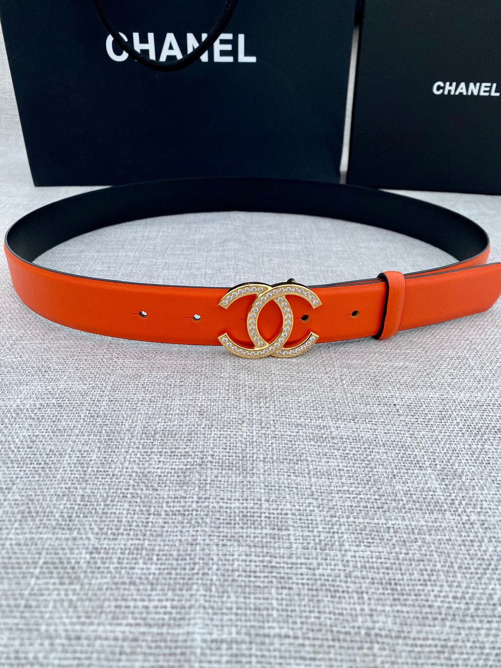 CC 26S BELT 30 MM IN ORANGE CALFSKIN GOLD HARDWARE 661518