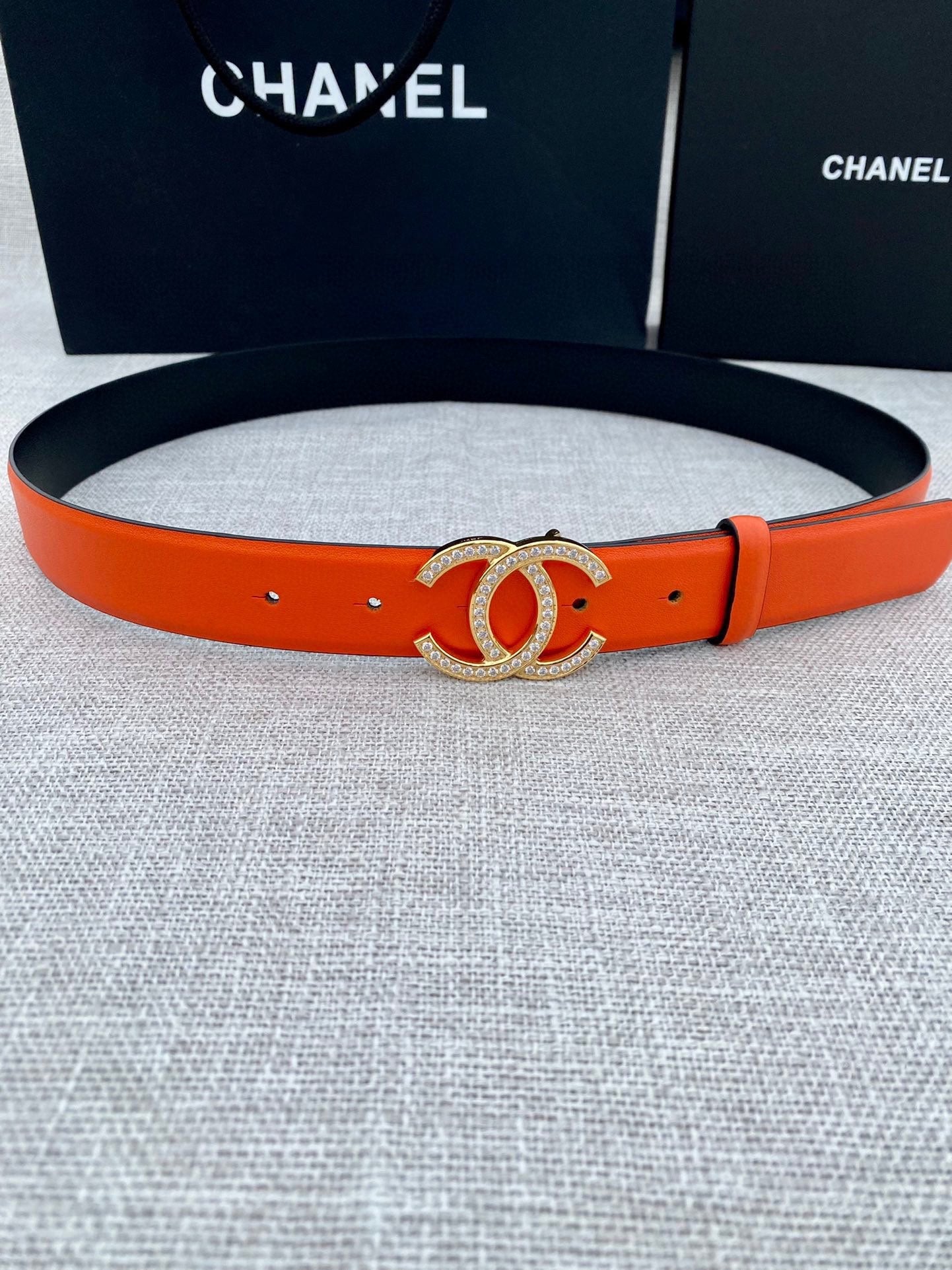 CC 26S BELT 30 MM IN ORANGE CALFSKIN GOLD HARDWARE 661518