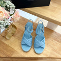 PRADA 26S CROSS STRAP ESPADRILLE WEDGE SANDALS IN SKY BLUE CALFSKIN
