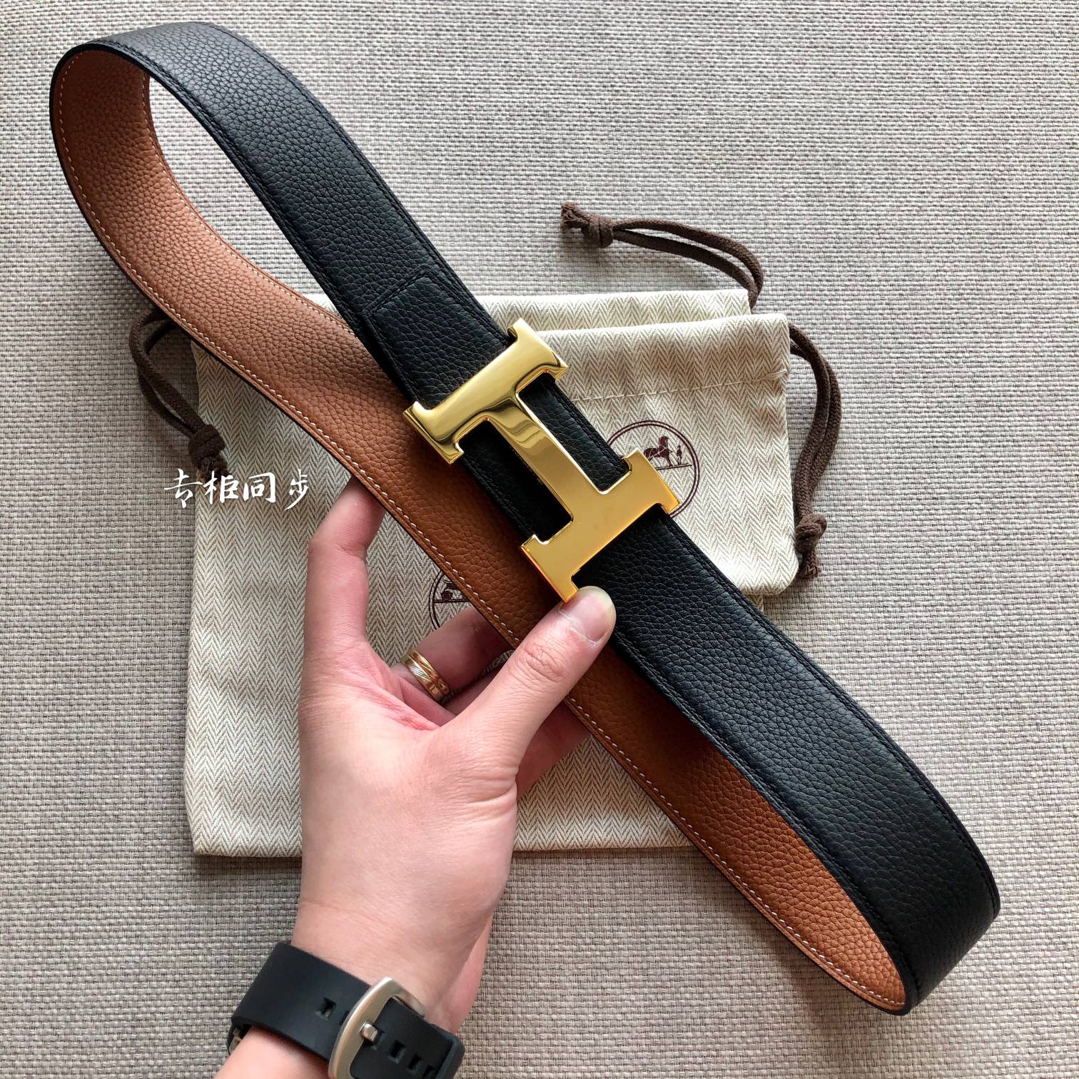 HM BELT BUCKLE & REVERSIBLE BLACK AND BRONZE BROWN LEATHER STRAP 38MM